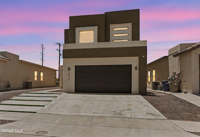 14904 John Mcneely Ave, El Paso, TX 79938 - modern home featuring stucco siding, driveway, and a garage