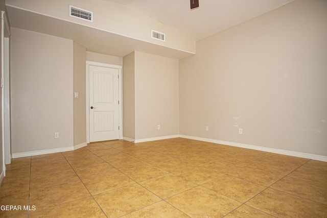 5353 Manuel Puentes Ct, El Paso, TX 79934 - empty room featuring vaulted ceiling, light tile patterned flooring, and ceiling fan