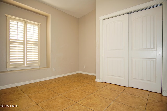 5353 Manuel Puentes Ct, El Paso, TX 79934 - unfurnished bedroom with a closet and light tile patterned flooring