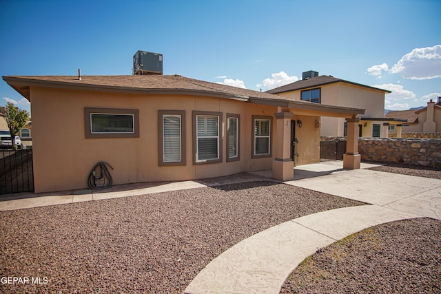 5353 Manuel Puentes Ct, El Paso, TX 79934 - rear view of property with a patio and stucco siding