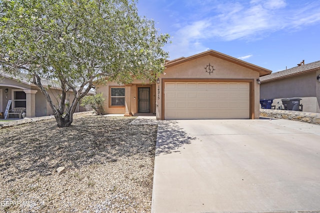 14215 Otter Point Ct, El Paso, TX 79938 - view of front of house with an attached garage, driveway, and stucco siding