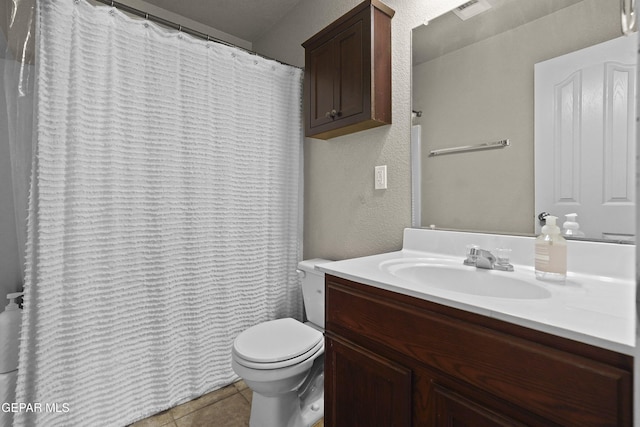 14215 Otter Point Ct, El Paso, TX 79938 - full bathroom featuring vanity, tile patterned floors, a textured wall, and a shower with curtain