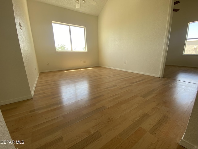 1409 Rainbow Ridge Dr, El Paso, TX 79912 - unfurnished room featuring ceiling fan, light wood finished floors, and a textured ceiling