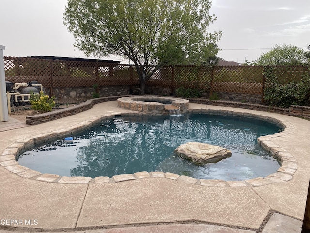 1409 Rainbow Ridge Dr, El Paso, TX 79912 - view of pool with a fenced backyard and a pool with connected hot tub