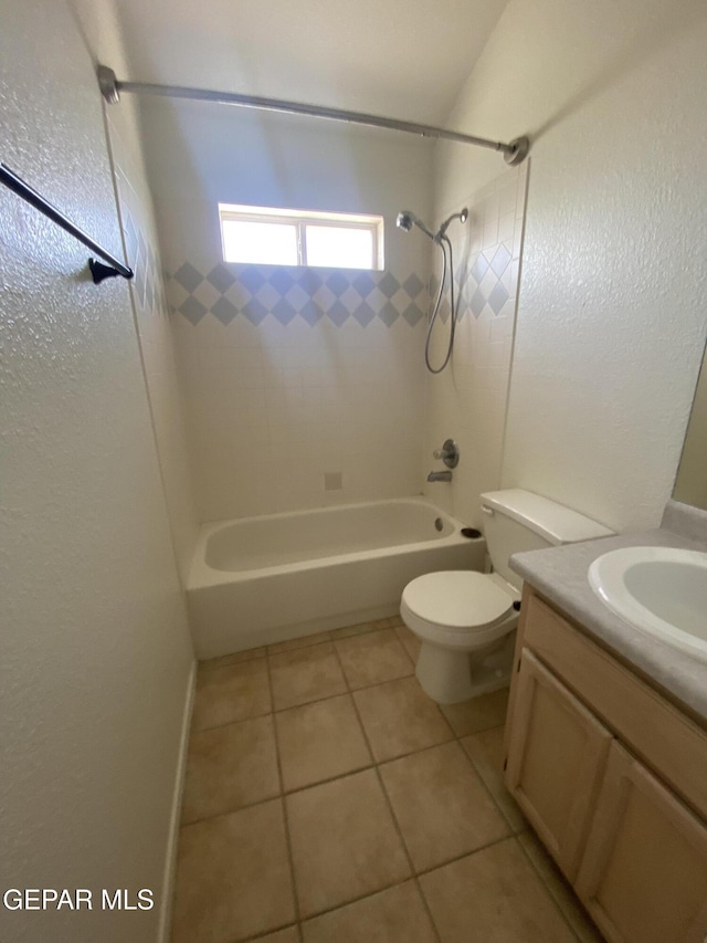 1409 Rainbow Ridge Dr, El Paso, TX 79912 - bathroom featuring shower / bathtub combination, vanity, tile patterned floors, and a textured wall