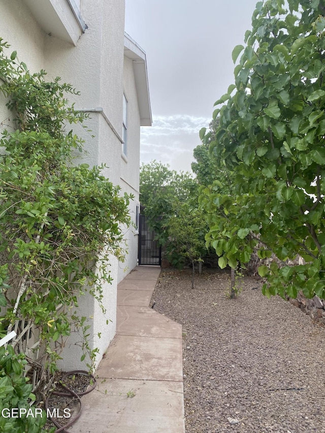 1409 Rainbow Ridge Dr, El Paso, TX 79912 - view of community with a gate