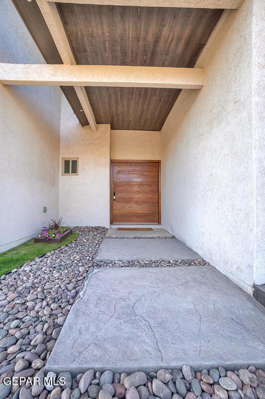 525 Cotton Blossom Ave, El Paso, TX 79922 - entrance to property with stucco siding