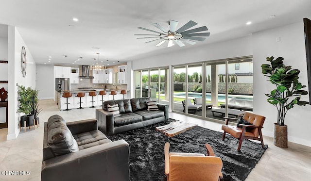 525 Cotton Blossom Ave, El Paso, TX 79922 - living room featuring a ceiling fan, recessed lighting, and a chandelier