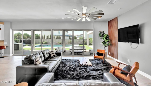 525 Cotton Blossom Ave, El Paso, TX 79922 - living area with a ceiling fan and plenty of natural light