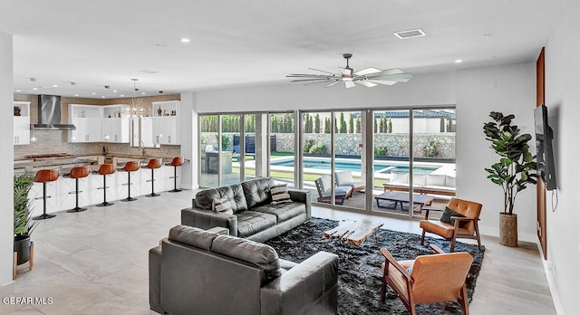 525 Cotton Blossom Ave, El Paso, TX 79922 - living area featuring a ceiling fan and recessed lighting