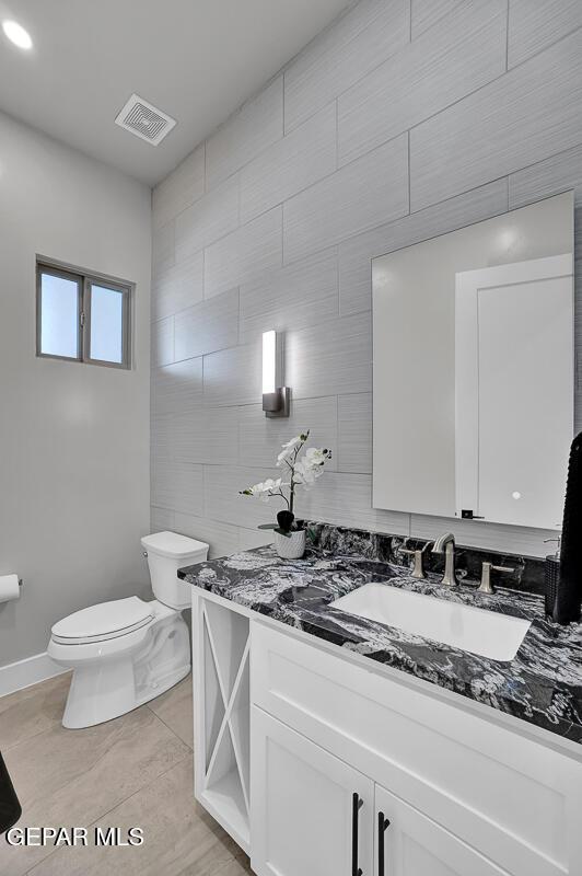 525 Cotton Blossom Ave, El Paso, TX 79922 - bathroom featuring vanity and tile patterned floors