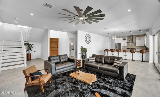 525 Cotton Blossom Ave, El Paso, TX 79922 - living area with ceiling fan, stairway, recessed lighting, and a chandelier