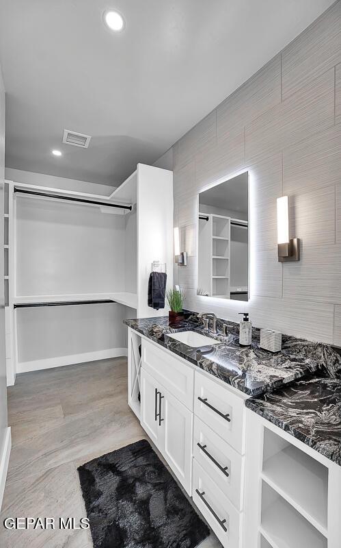 525 Cotton Blossom Ave, El Paso, TX 79922 - bathroom featuring vanity and recessed lighting
