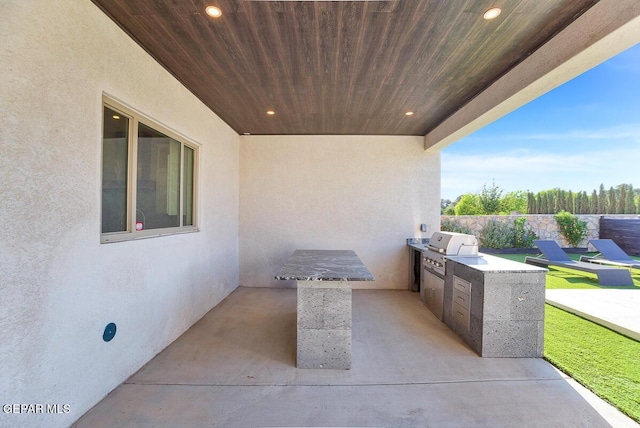 525 Cotton Blossom Ave, El Paso, TX 79922 - view of patio featuring an outdoor kitchen