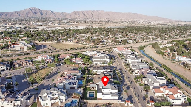 525 Cotton Blossom Ave, El Paso, TX 79922 - aerial overview of property's location with nearby suburban area and mountains