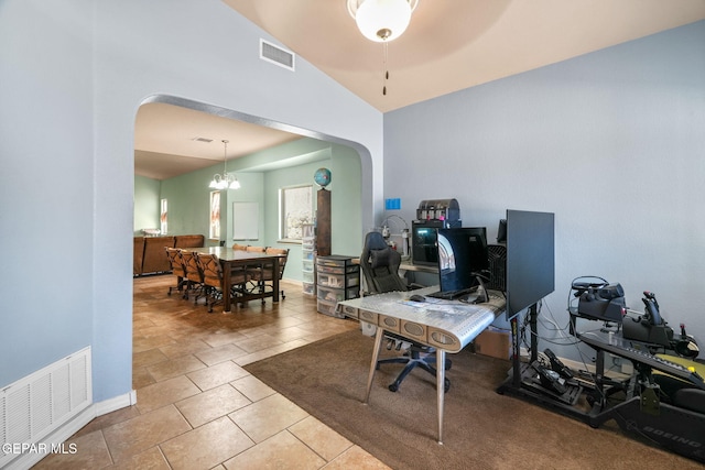 14605 Spanish Point Dr, El Paso, TX 79938 - tiled office with arched walkways, lofted ceiling, a chandelier, and a ceiling fan