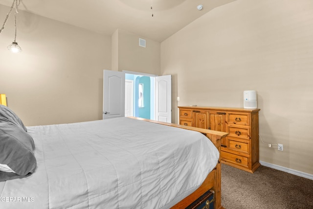 14605 Spanish Point Dr, El Paso, TX 79938 - carpeted bedroom featuring vaulted ceiling and baseboards