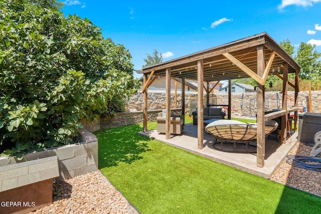 14605 Spanish Point Dr, El Paso, TX 79938 - fenced backyard with outdoor lounge area and a patio area