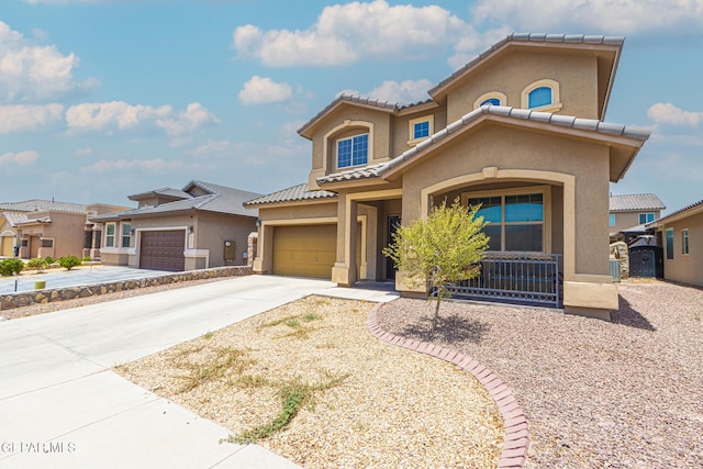 12355 Joe Gomez, El Paso, TX 79928 - mediterranean / spanish-style home featuring stucco siding, driveway, covered porch, and a tile roof