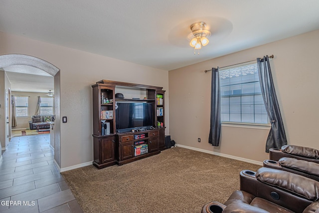 12355 Joe Gomez, El Paso, TX 79928 - tiled living area featuring a ceiling fan and baseboards