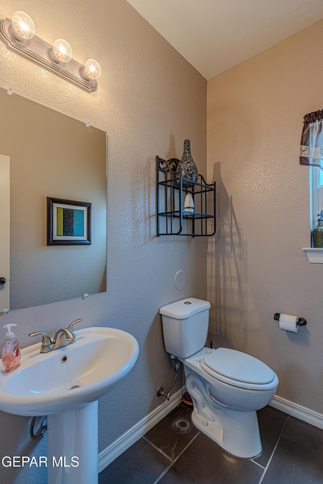 12355 Joe Gomez, El Paso, TX 79928 - bathroom featuring toilet and tile patterned floors