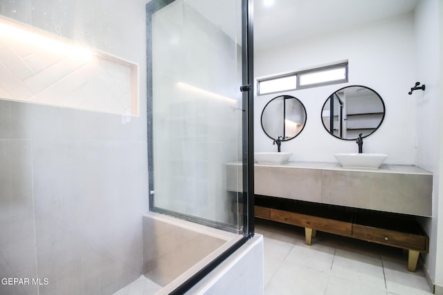 1465 Fito Hernandez St, El Paso, TX 79928 - full bathroom featuring a shower with shower door, double vanity, and tile patterned flooring