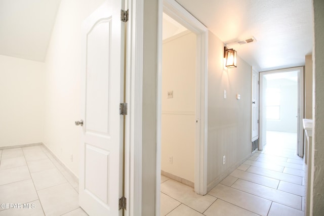 1465 Fito Hernandez St, El Paso, TX 79928 - hallway featuring light tile patterned flooring