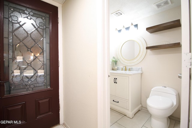 1465 Fito Hernandez St, El Paso, TX 79928 - half bathroom featuring vanity and tile patterned floors