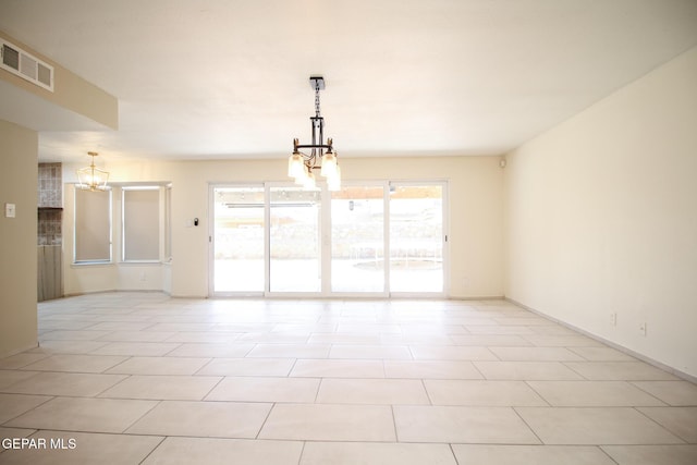 1465 Fito Hernandez St, El Paso, TX 79928 - spare room featuring a chandelier and light tile patterned floors