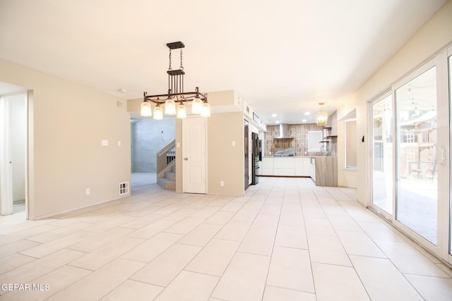 1465 Fito Hernandez St, El Paso, TX 79928 - unfurnished living room with stairway, a chandelier, and light tile patterned floors