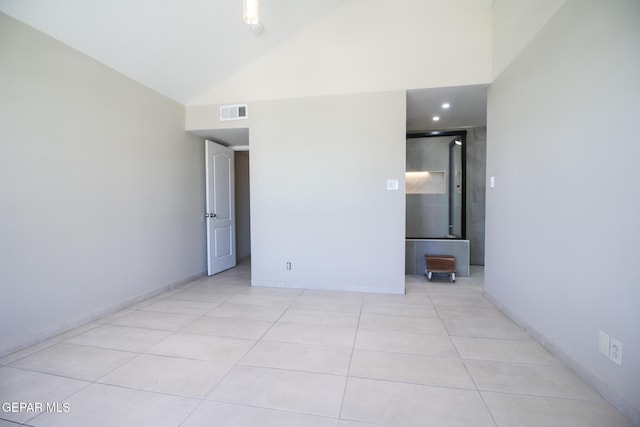 1465 Fito Hernandez St, El Paso, TX 79928 - unfurnished room with high vaulted ceiling and light tile patterned floors
