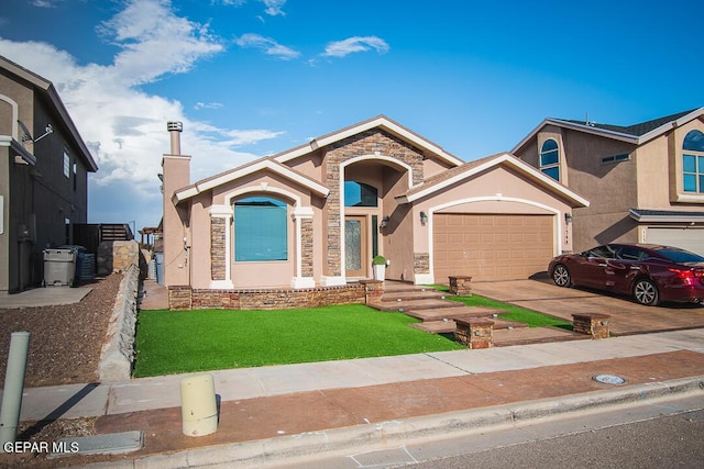 11344 Acoma St, El Paso, TX 79934 - view of front facade featuring stucco siding, a front yard, concrete driveway, an attached garage, and stone siding