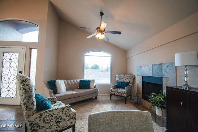 11344 Acoma St, El Paso, TX 79934 - living area with a ceiling fan, lofted ceiling, and a tile fireplace