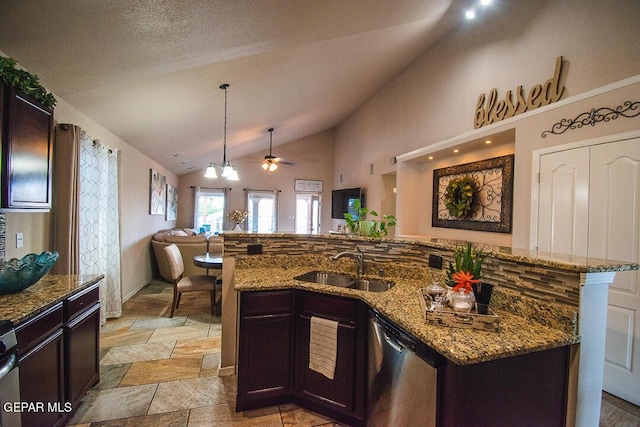 11344 Acoma St, El Paso, TX 79934 - kitchen featuring stainless steel dishwasher, ceiling fan, open floor plan, dark stone counters, and a center island with sink