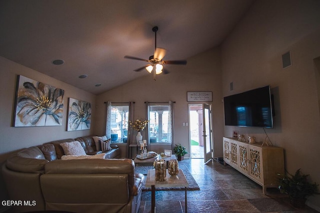 11344 Acoma St, El Paso, TX 79934 - living room with stone tile floors, vaulted ceiling, and a ceiling fan