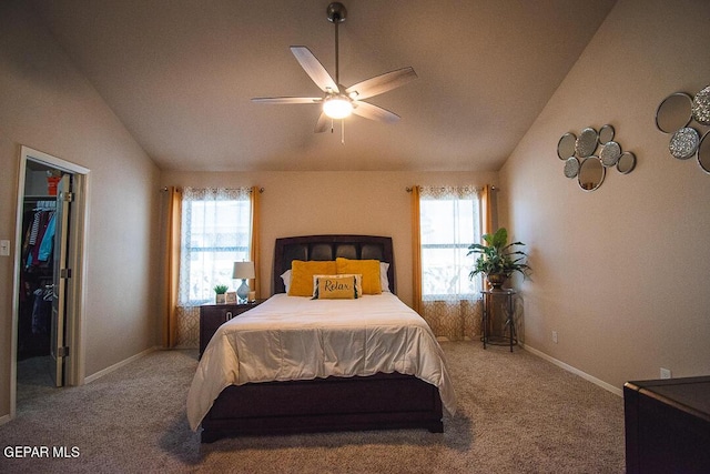11344 Acoma St, El Paso, TX 79934 - carpeted bedroom featuring vaulted ceiling, multiple windows, and ceiling fan