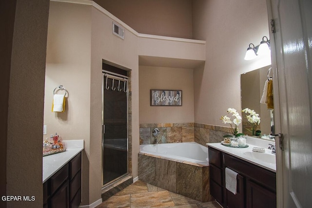 11344 Acoma St, El Paso, TX 79934 - full bath featuring vanity, a garden tub, a stall shower, and tile patterned floors