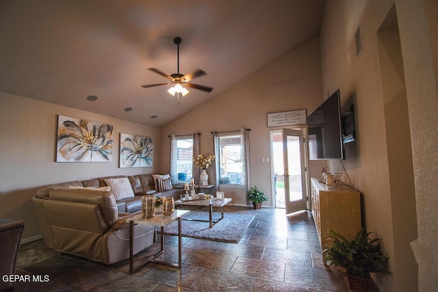 11344 Acoma St, El Paso, TX 79934 - living area featuring ceiling fan, stone tile floors, and high vaulted ceiling