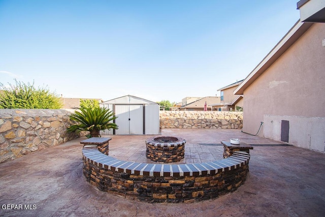 11344 Acoma St, El Paso, TX 79934 - view of patio featuring a shed and a fire pit