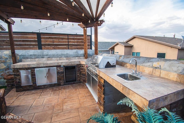 11344 Acoma St, El Paso, TX 79934 - view of patio with beverage cooler and area for grilling