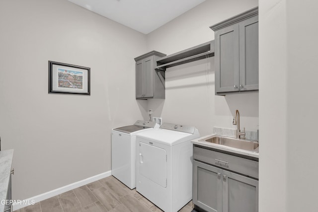 737 Al Smith Ln, El Paso, TX 79932 - laundry area featuring cabinet space and washing machine and clothes dryer