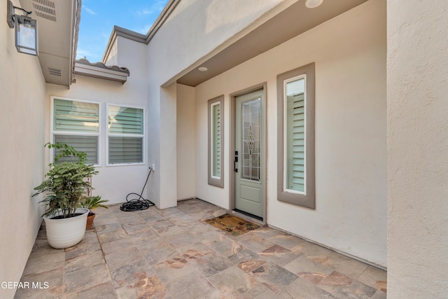 737 Al Smith Ln, El Paso, TX 79932 - entrance to property with stucco siding and a patio area