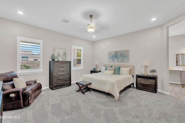 737 Al Smith Ln, El Paso, TX 79932 - carpeted bedroom with multiple windows, recessed lighting, and ensuite bath