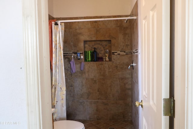 9421 Ariel Rico Ct, El Paso, TX 79907 - full bathroom with a stall shower and toilet