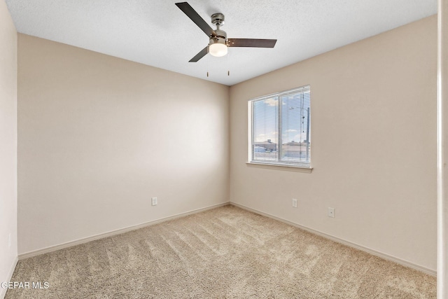 14330 Woods Point Ave, El Paso, TX 79938 - carpeted spare room featuring ceiling fan and baseboards