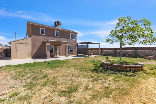 14330 Woods Point Ave, El Paso, TX 79938 - rear view of property featuring a patio, a fenced backyard, and a pergola