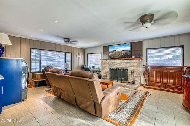 4327 Oxford Ave, El Paso, TX 79903 - living area featuring ceiling fan, tile patterned flooring, a fireplace, ornamental molding, and recessed lighting