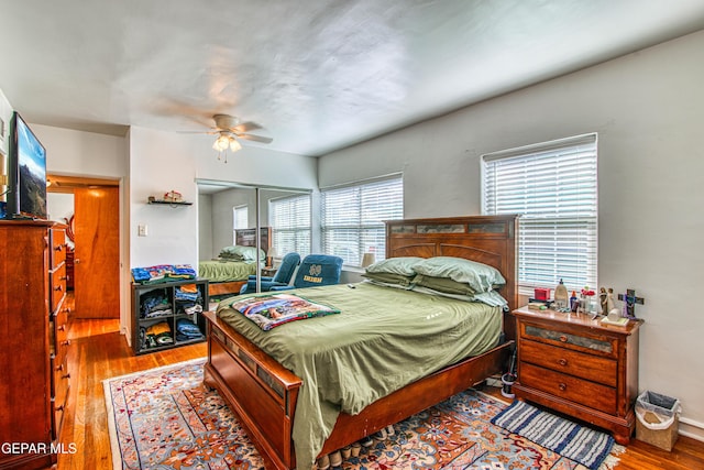 4327 Oxford Ave, El Paso, TX 79903 - bedroom featuring wood finished floors, a ceiling fan, and a closet