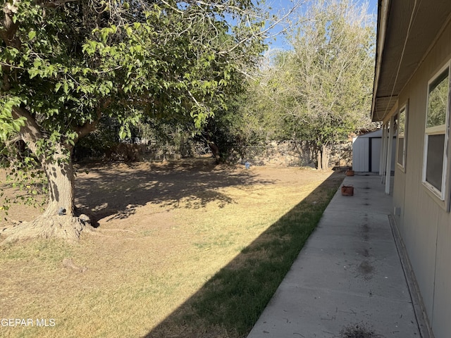 8429 Lasso Cir, El Paso, TX 79907 - view of yard featuring a storage unit