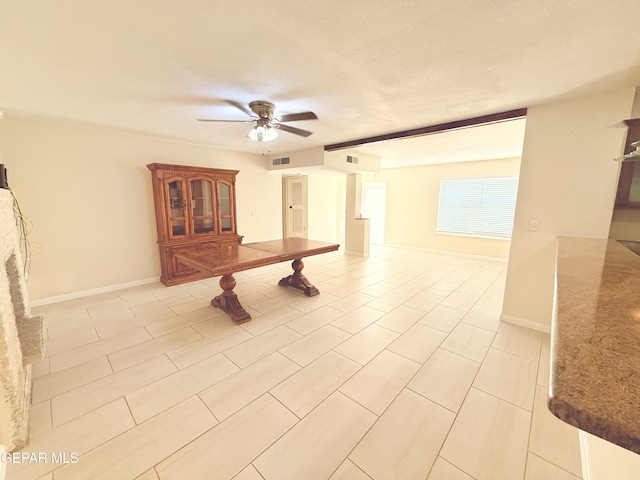 8429 Lasso Cir, El Paso, TX 79907 - spare room with ceiling fan and light tile patterned floors